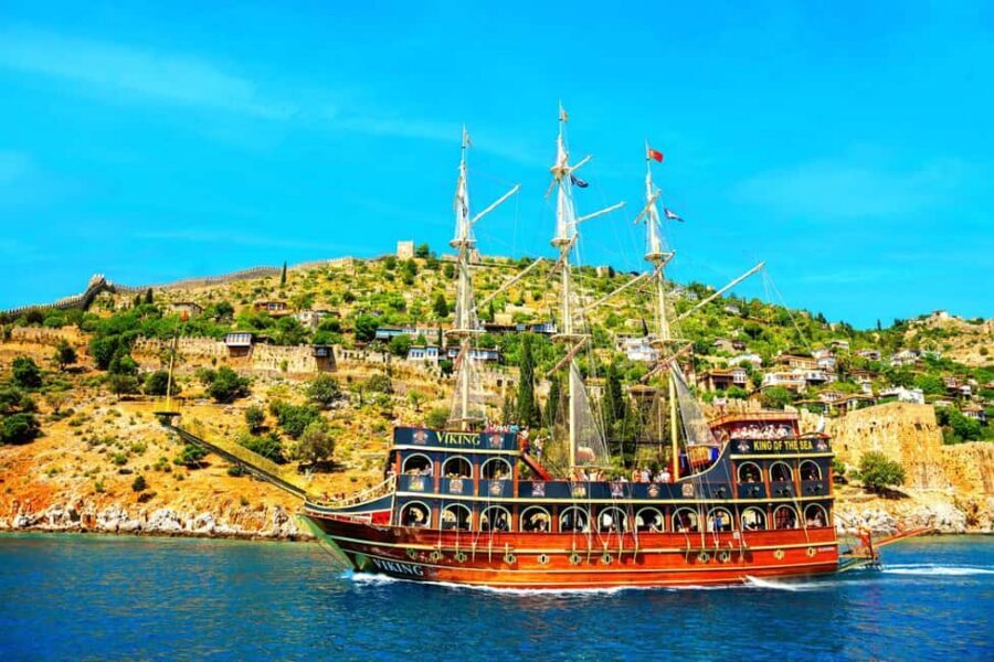 Alanya: Biggest Pirate Boat Tour with Soft Drinks and Lunch - Cleopatra Beach Stop: Photos, Swimming, and Dolphin Watching