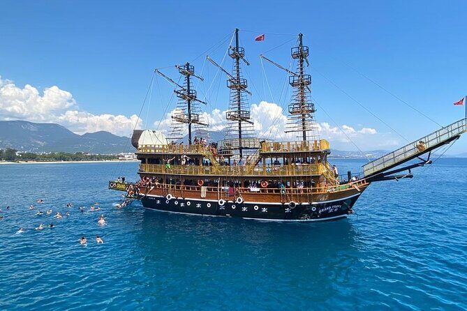 Alanya Grand Pirate Boat Tour with Lunch, Soft Drinks & Transfer - Alanya Kalesi time: commentary, swimming breaks, and cliff-jump options
