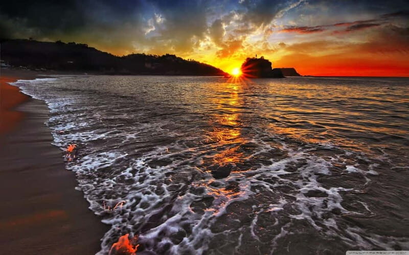 Alanya Optional Alcoholic Sunset Boat Cruise and Foam Party - The first swimming break: Red Tower at sunset