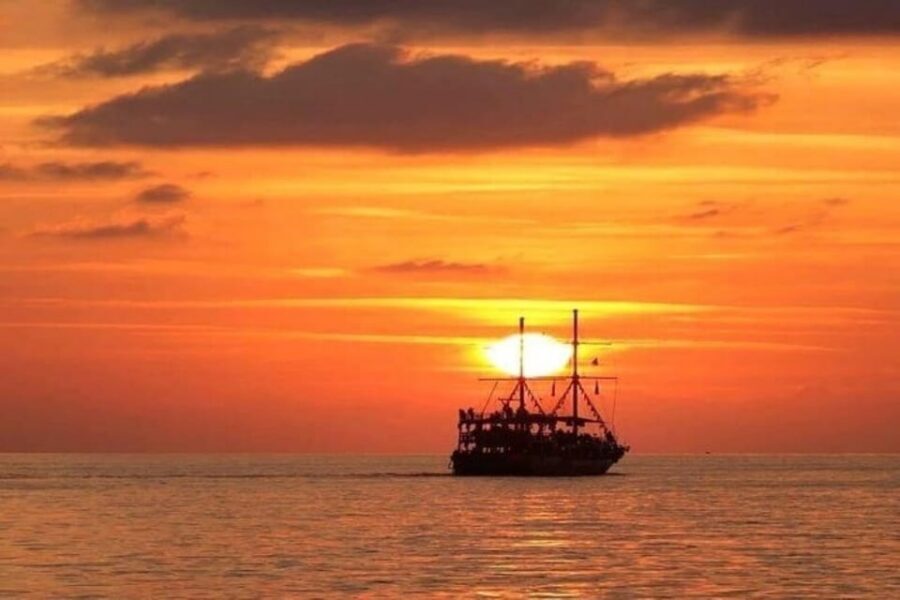 Alanya Sunset Boat: Foam Party & Dinner & Swimming Stops - Red Tower and Old Shipyard Swim: The First Stop With Big-Scene Views