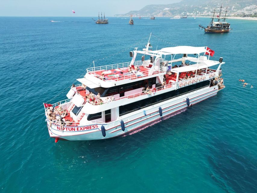 From Alanya: Boat Tour with Unlimited Soft Drinks and Lunch - The boat layout and comfort: sun beds, toilets, and a bar