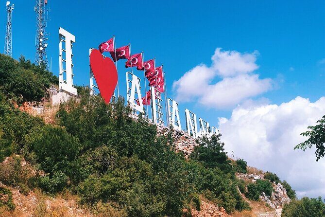 From Alanya: Sightseeing Half Day City Tour w/Cable Car - Cleopatra Beach stop: sea air, golden sand, and fast photo time