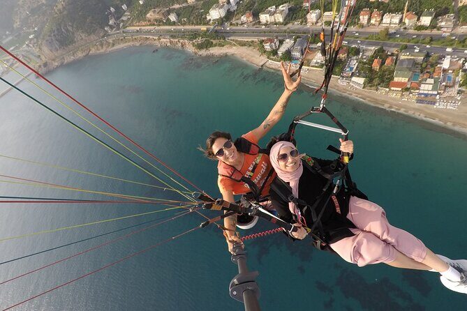 Halal Tandem Paragliding With Licensed Woman Pilot in Alanya - Kleopatra Plajı from above: the stop that drives the whole experience